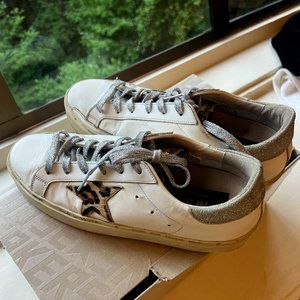 Golden Goose platform sneaker with genuine calf hair star.